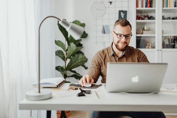 Man working on laptop at a desk